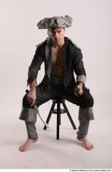 JACK PIRATE SITTING POSE WITH GUN AND DAGGER